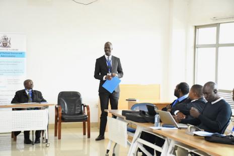 The Chairman, Dr. Oscar Otele, delivering his address to the participants